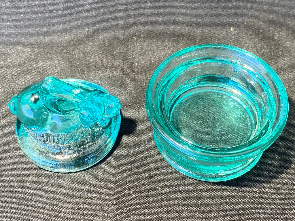 Green Vaseline uranium glass bunny rabbit on nest basket Easter glows teal blue