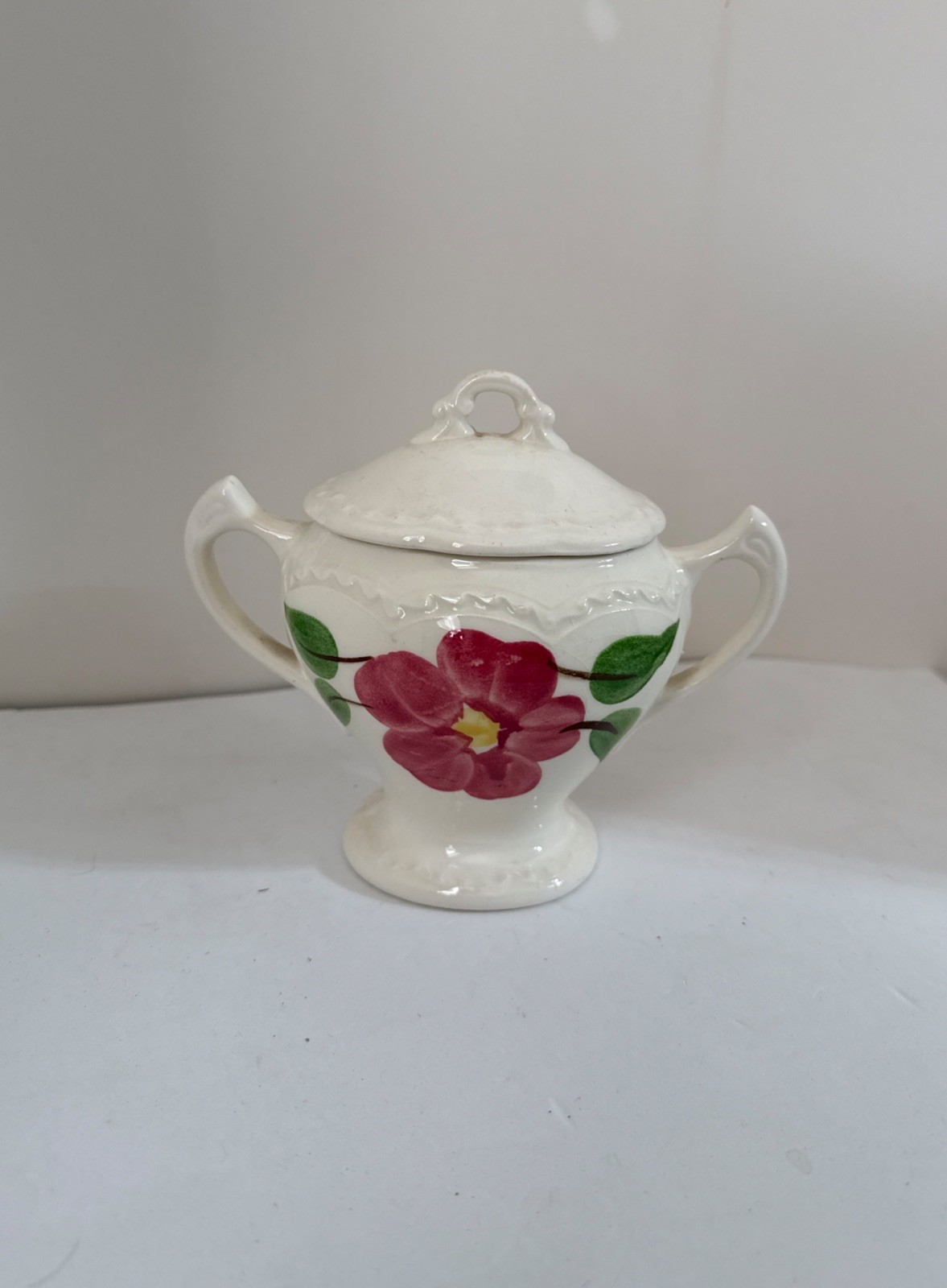 5 1/2 Inches High 6” Wide Including Handles