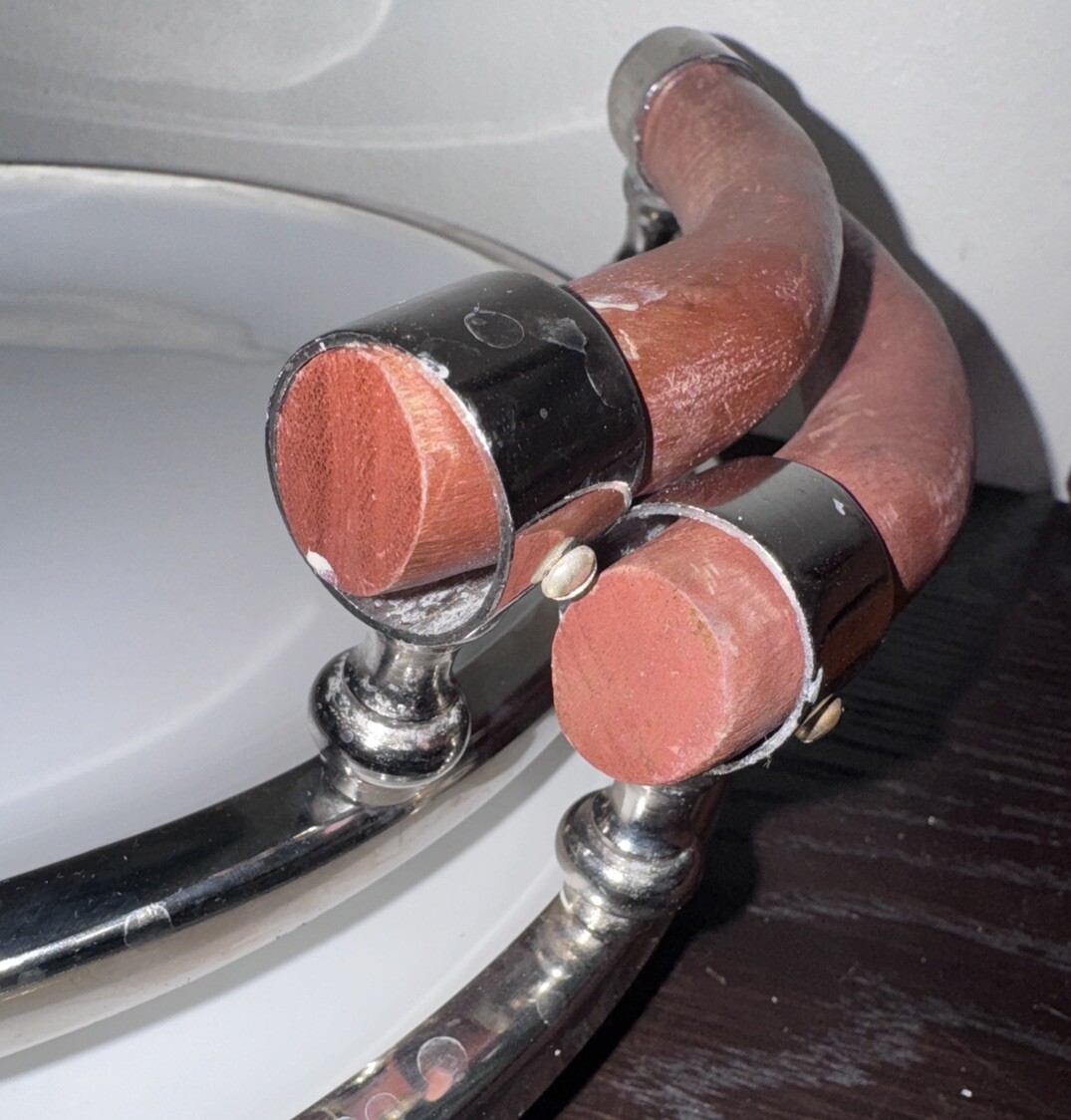 Set Of Two White Ceramic Salad Trys With Wooden Handles And Chrome Rims.