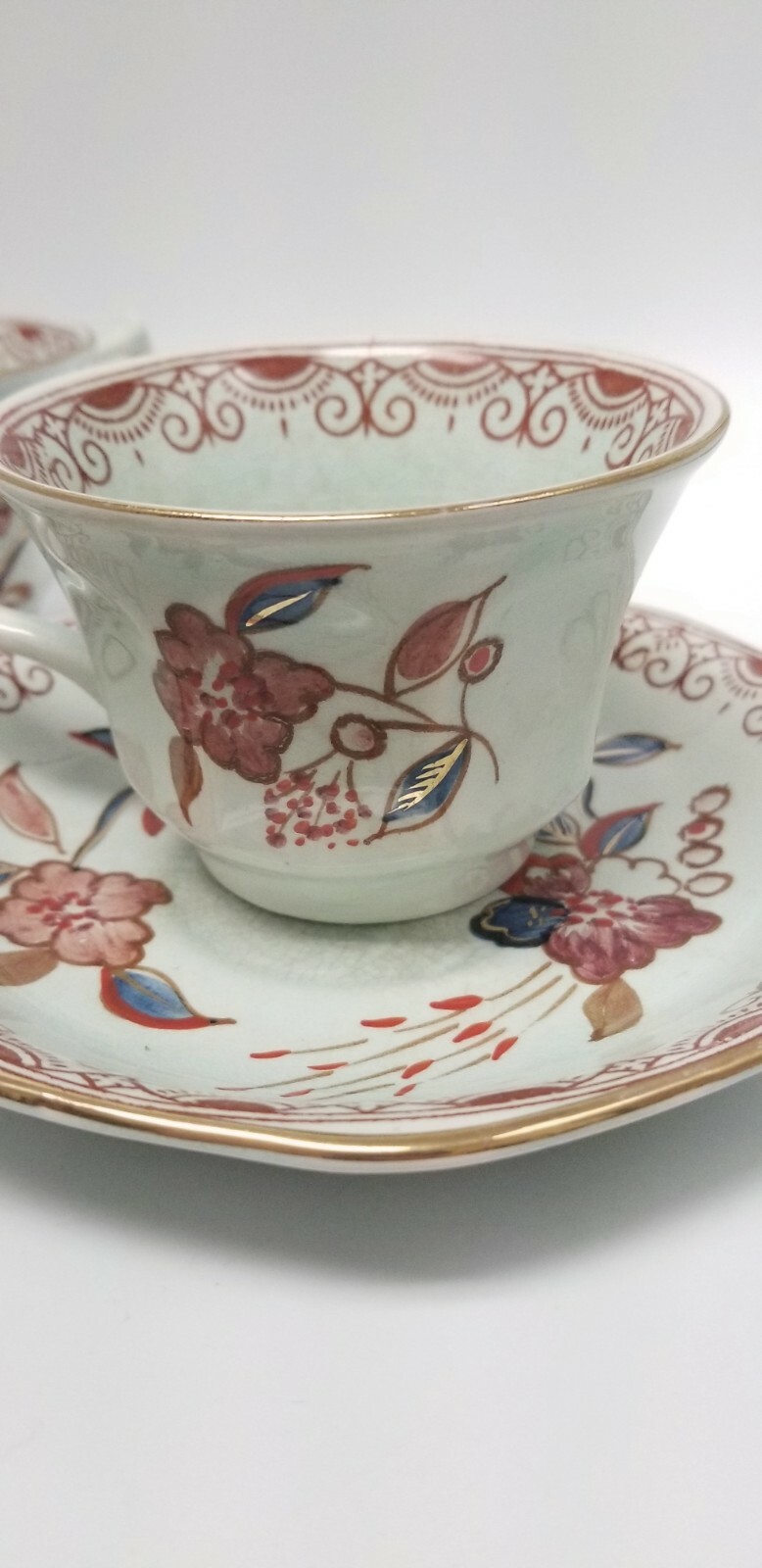 Calyx Ware hand painted 2 teacup saucer set gold light green rust blue England