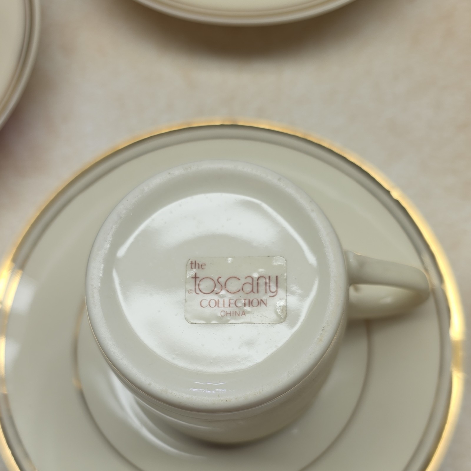 Toscany Collection China Ivory Gold Cup & Saucer Set Twelve-Piece Glossy Finish