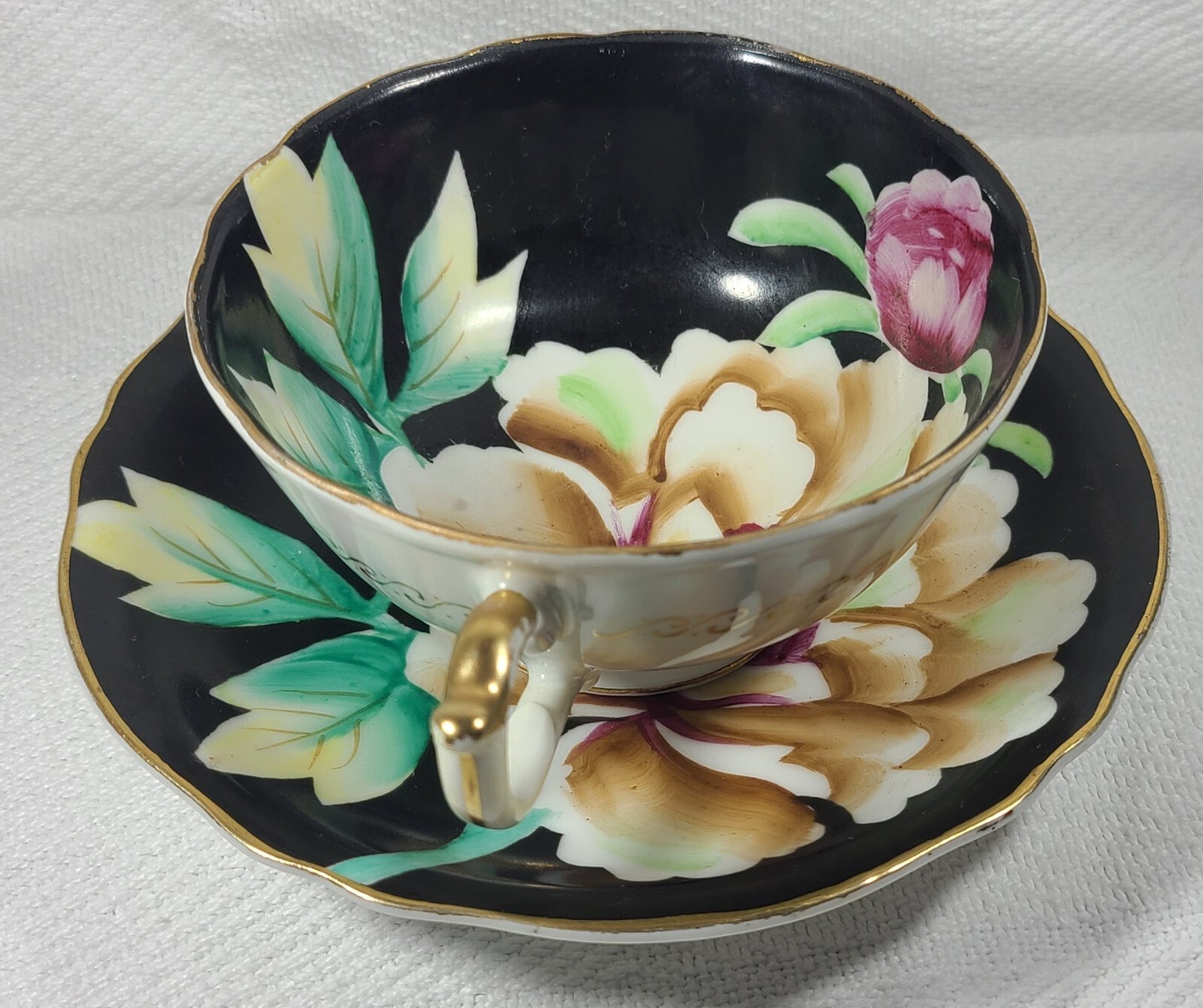 Hand Painted Orion Teacup and Saucer Made in Occupied Japan Black w/ Flowers