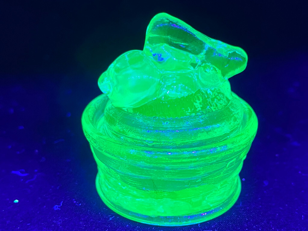 Green Vaseline uranium glass bunny rabbit on nest basket Easter glows teal blue