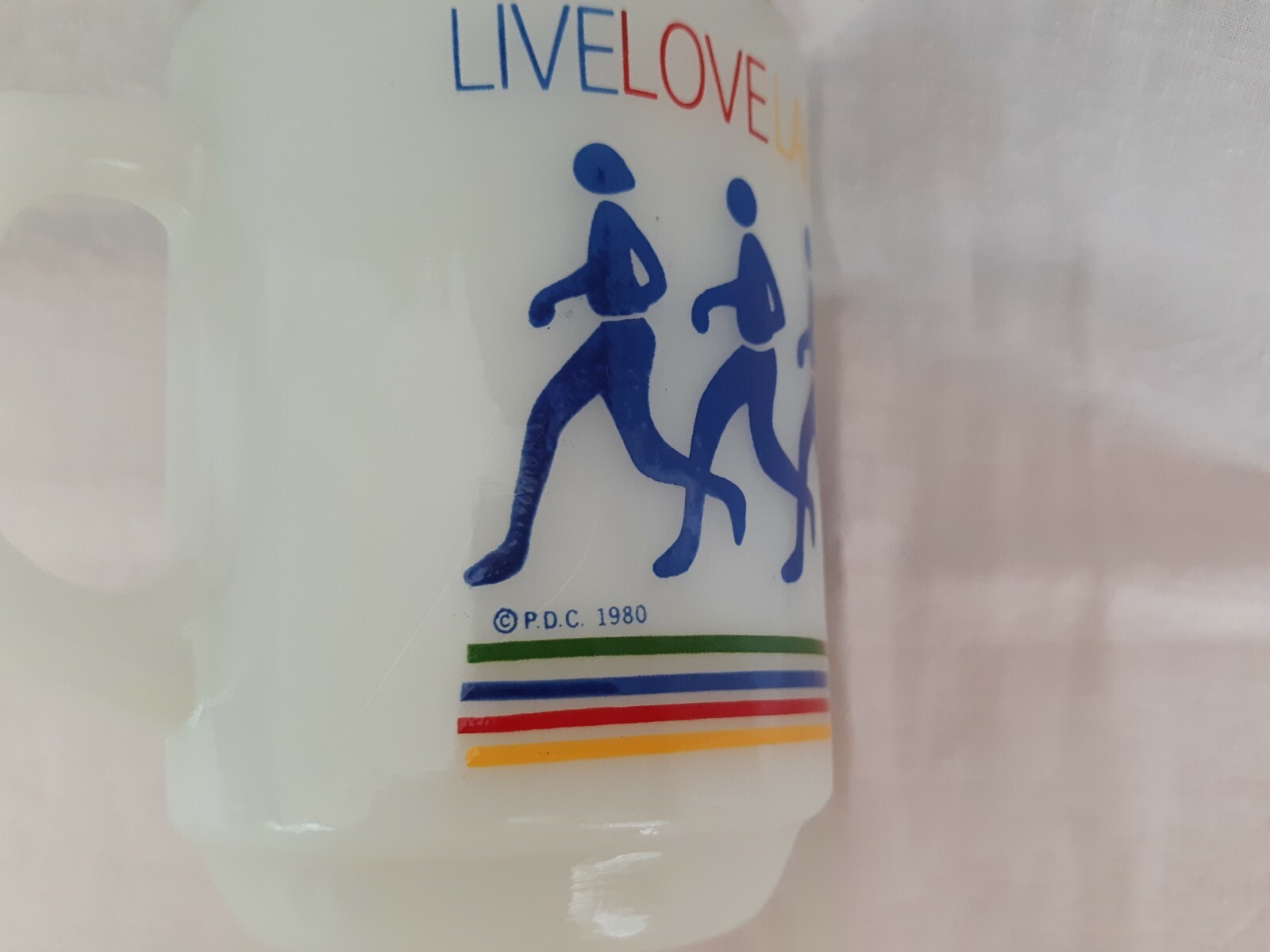 1980 Anchor Hocking FireKing Rainbow Runner Live Love Laugh Play Milk Glass Mug