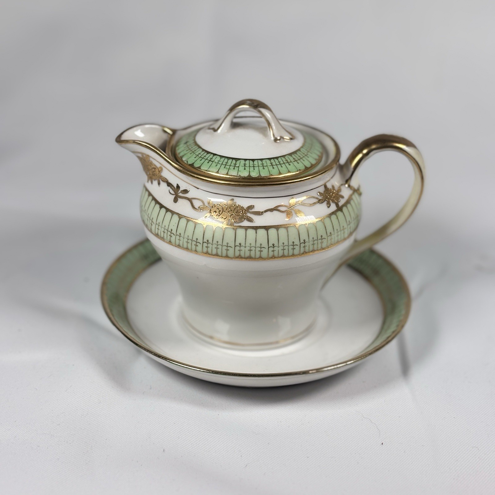 Antique Nippon Hand Painted Porcelain Creamer with lid And Saucer