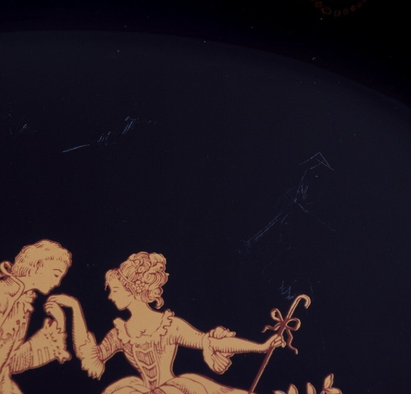 Limoges, France. Two porcelain serving platters adorned with 22-karat gold leaf