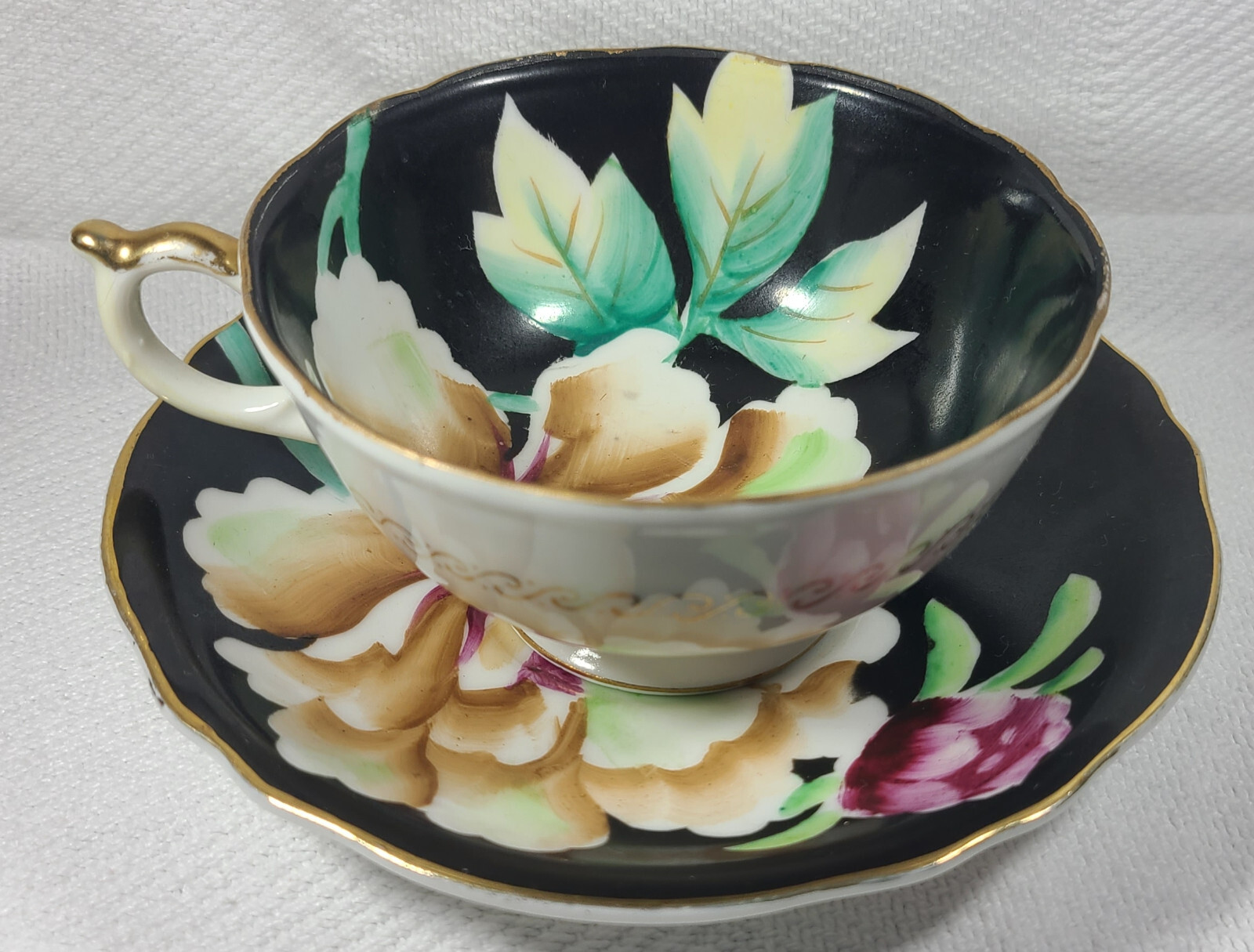 Hand Painted Orion Teacup and Saucer Made in Occupied Japan Black w/ Flowers
