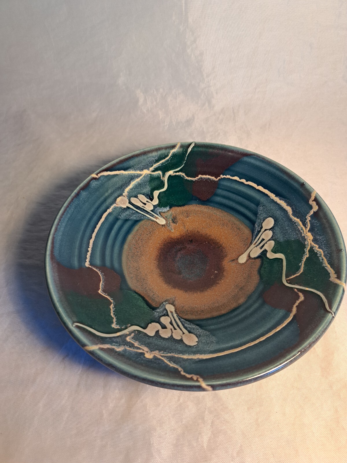 Blue /brown/tan and grey pottery bowl, use for food or trinkets. 7.5″ diameter.