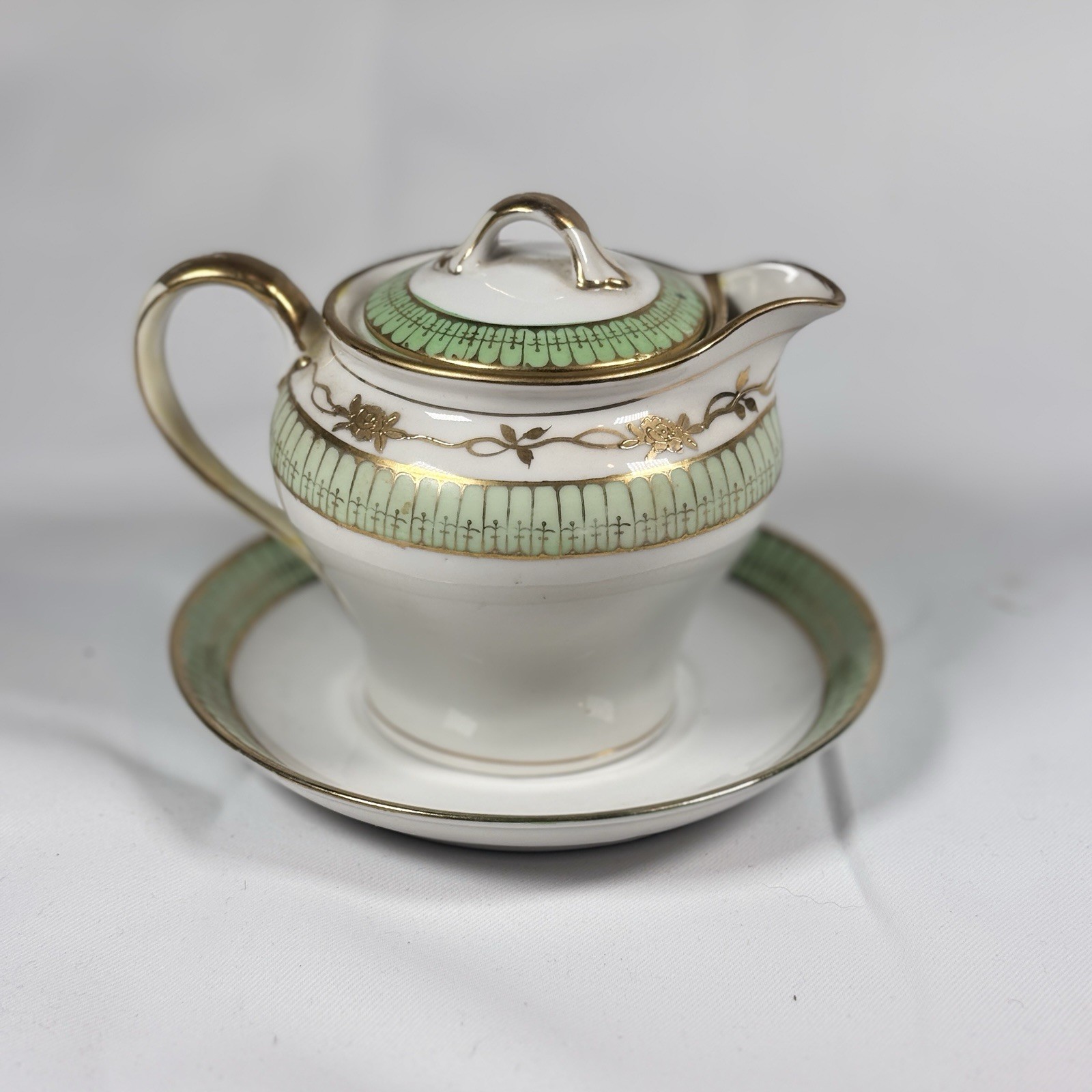 Antique Nippon Hand Painted Porcelain Creamer with lid And Saucer