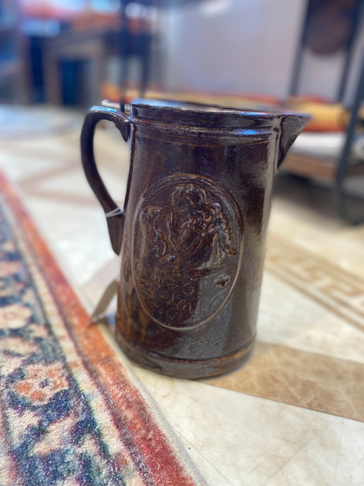 Early (1905 – 1925) Brown “Girl with Dog” Brown Stoneware Salt Glazed Pitcher
