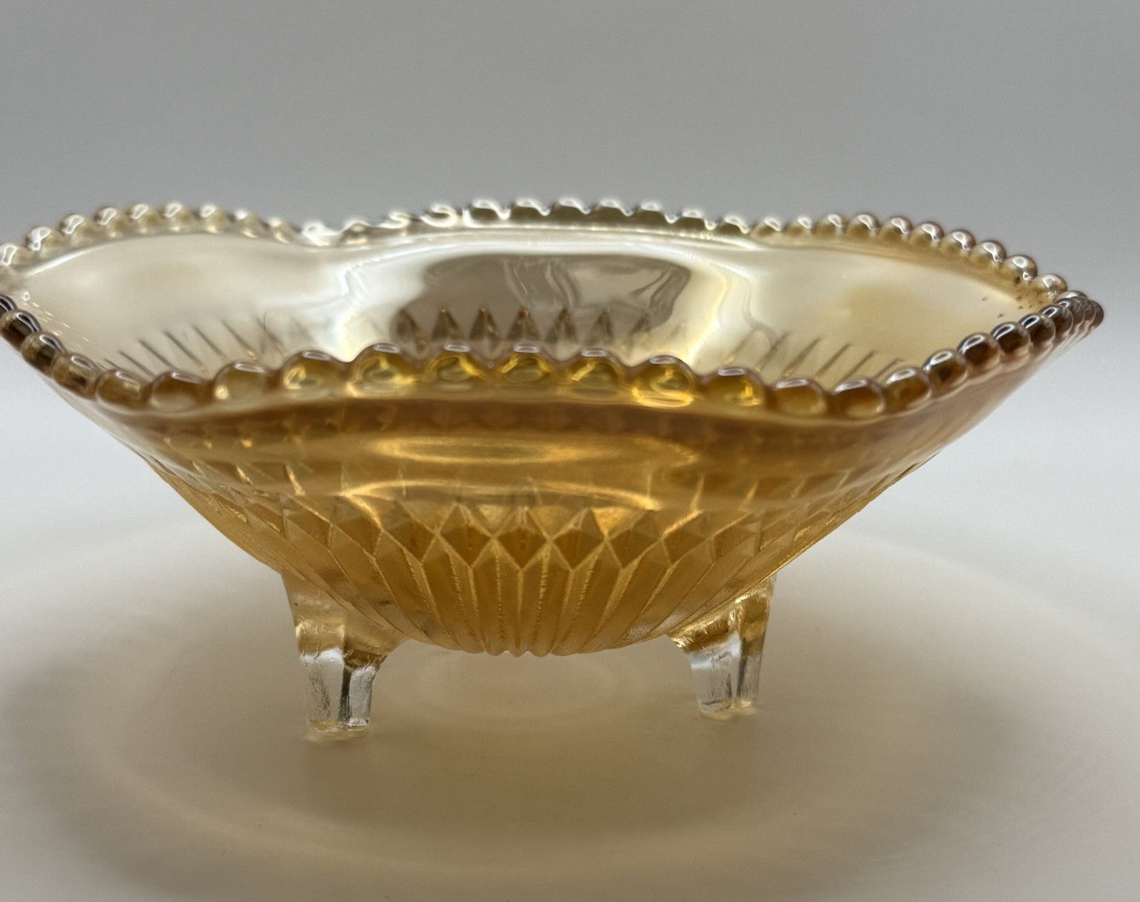 Vintage Carnival Glass Jeanette Glass 3 Footed Marigold ‘Anniversary’ Bowl 6.5”