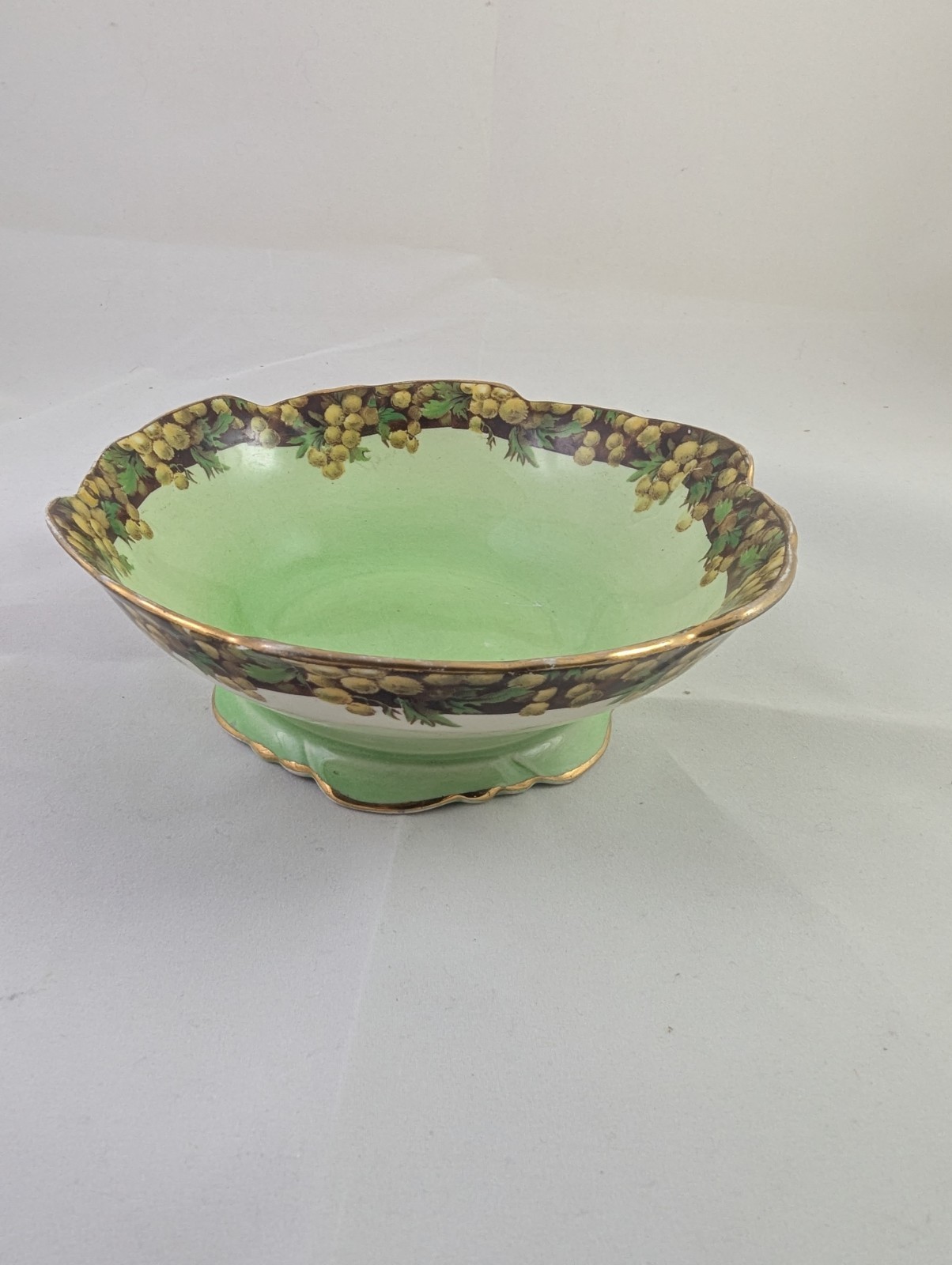 Vintage Royal Winton hand-painted porcelain decorative bowl with a floral border