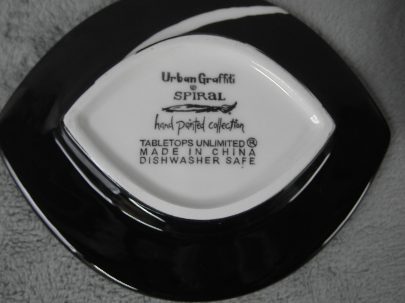 Tabletops Unlimited Urban Graffiti Spiral Saucer Plate White/ Black 4pc Set 5.5”
