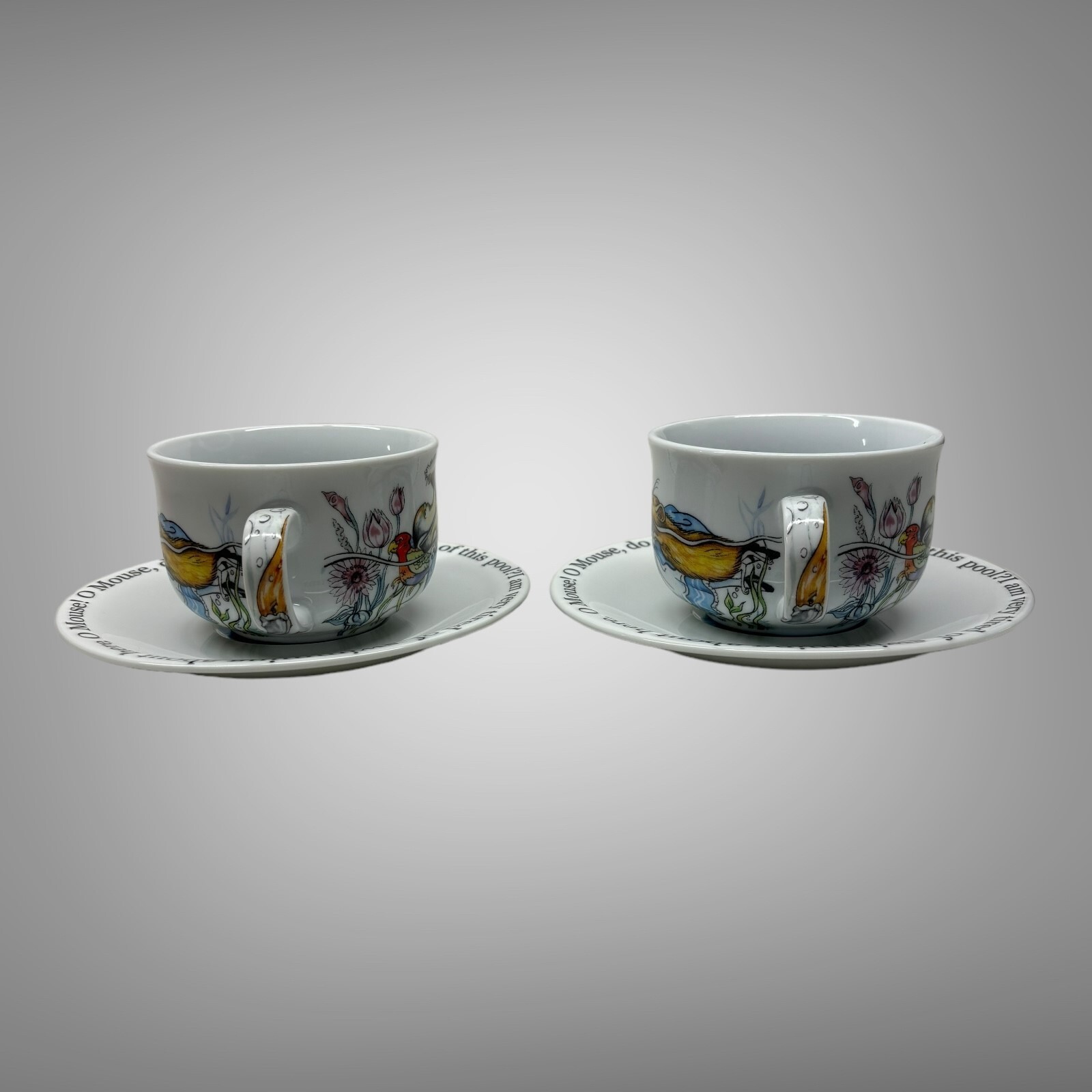 New 2010 Paul Cardew Alice in Wonderland Cafe Teacup & Saucers Set of 2 England