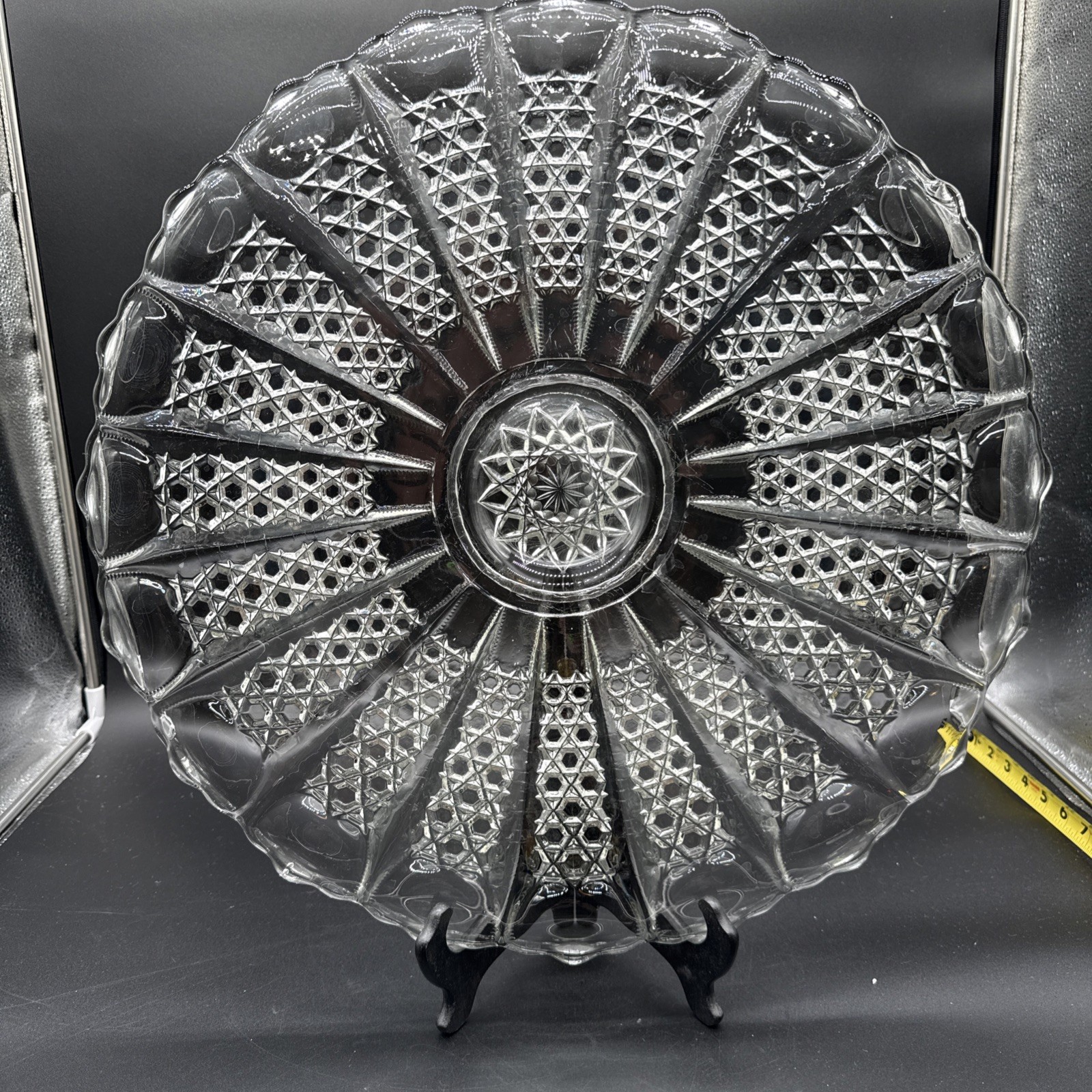 Cut crystal glass plate with radial diamond pattern