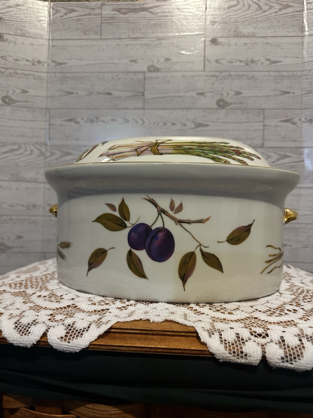 Set of three Royal Worcester Evesham Gold porcelain serving dishes with lids.