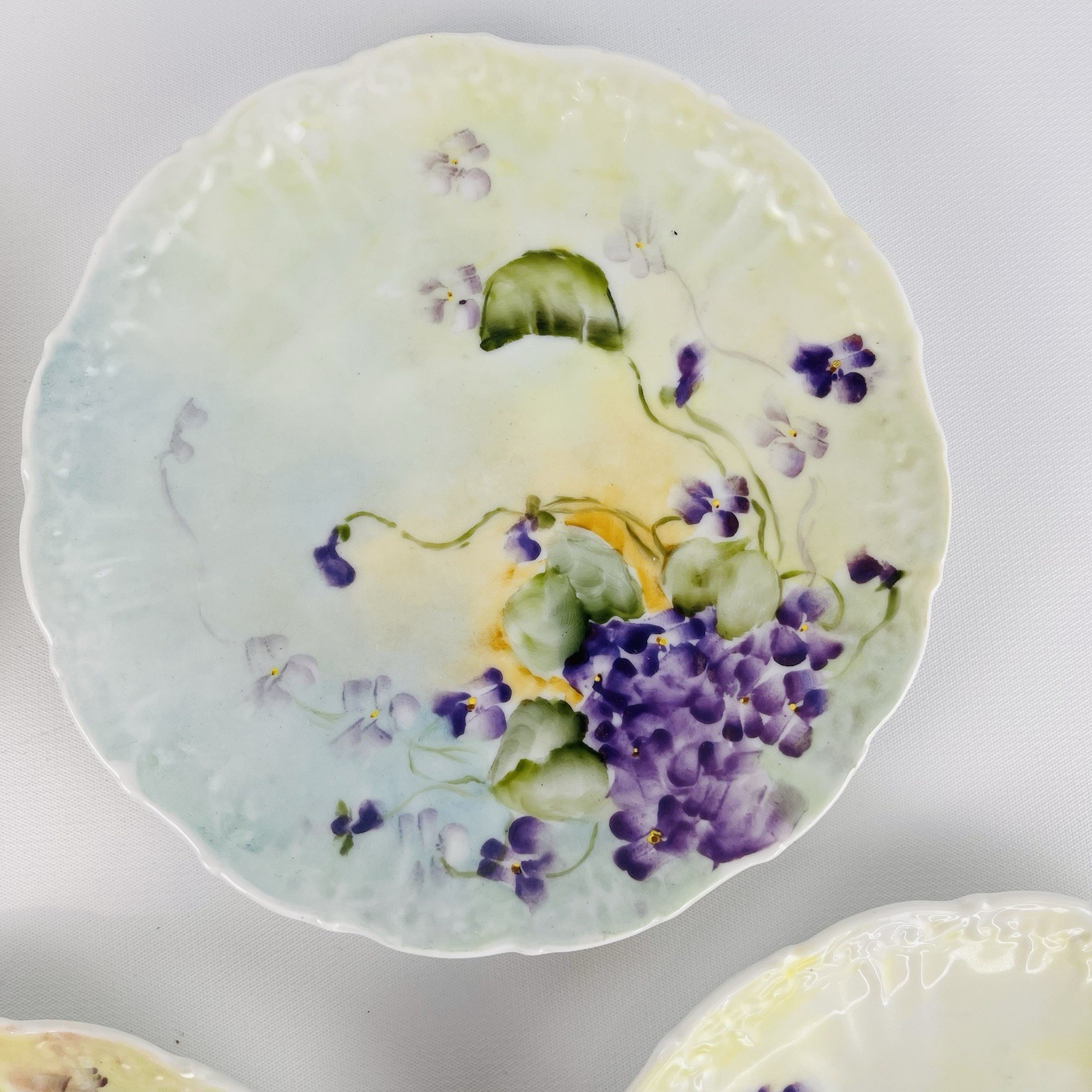 5 Antique Hand Painted Purple Violets 6″ Scalloped Dessert Cabinet Wall Plates