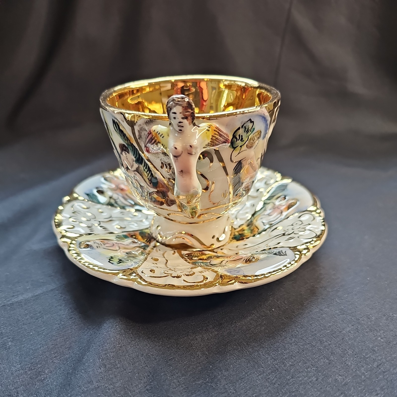 Vintage CAPODIMONTE Porcelain Hand painted Cherubs Tea Cup & Saucer, Gold Trim