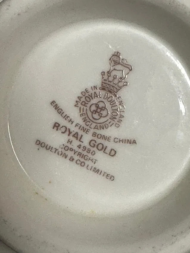 Royal Doulton “Royal Gold” dinnerware, plates, cups, serveware