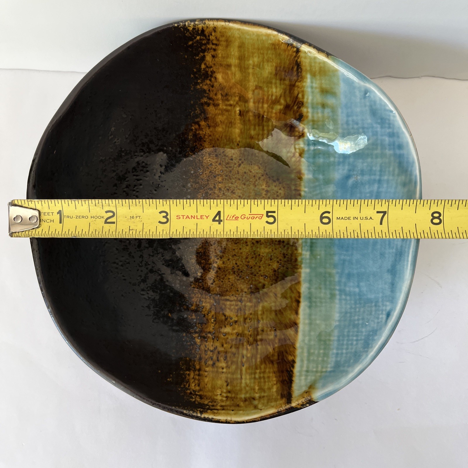 Pier 1 Cassidy asymmetrical bowl -blue and brown crackled, textured glaze