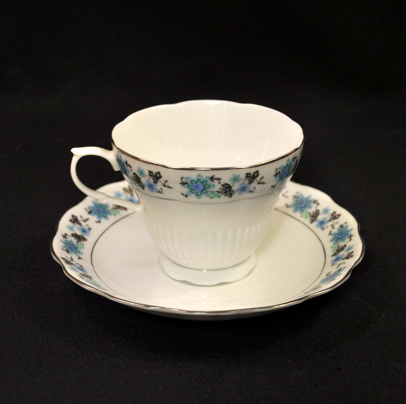 Cup & Saucer Floral w/Platinum on White Blue Black Scalloped Made in China