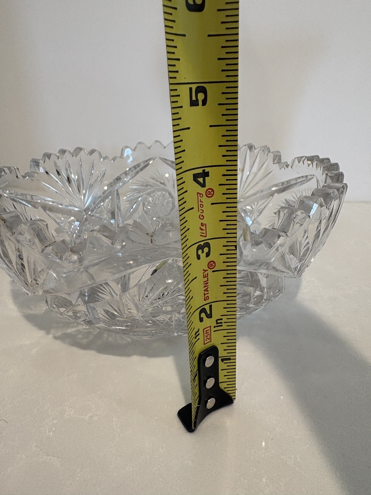 Vintage American Brilliant Cut Glass Bowl in star design w/ sawtooth edge.