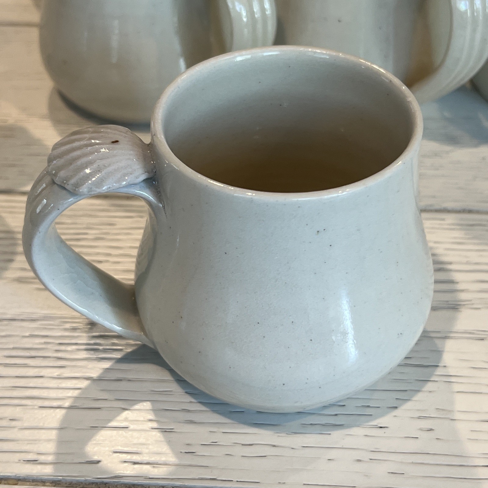 8 Pc Hand Thrown Beige Clay Pottery Coffee Tea Mugs Seashell Handle Stamped Set