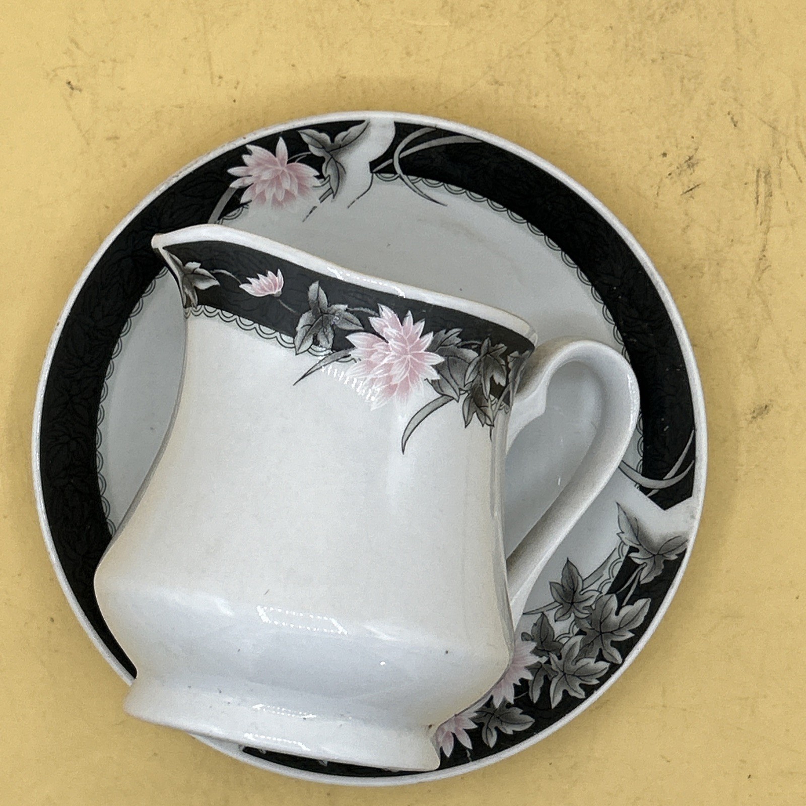 Fine China Ceramic Creamer And Saucer