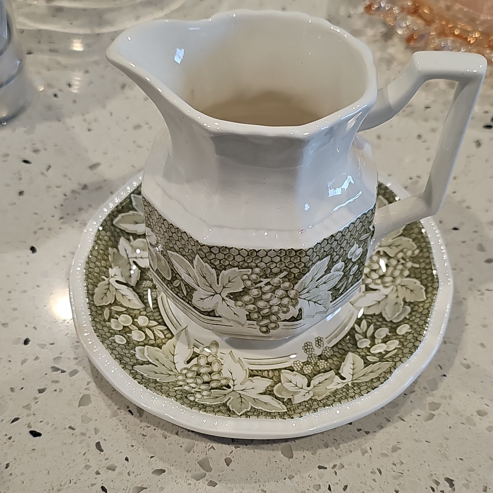 Vintage Kensington Staffords Somerset ironstone creamer and saucer.