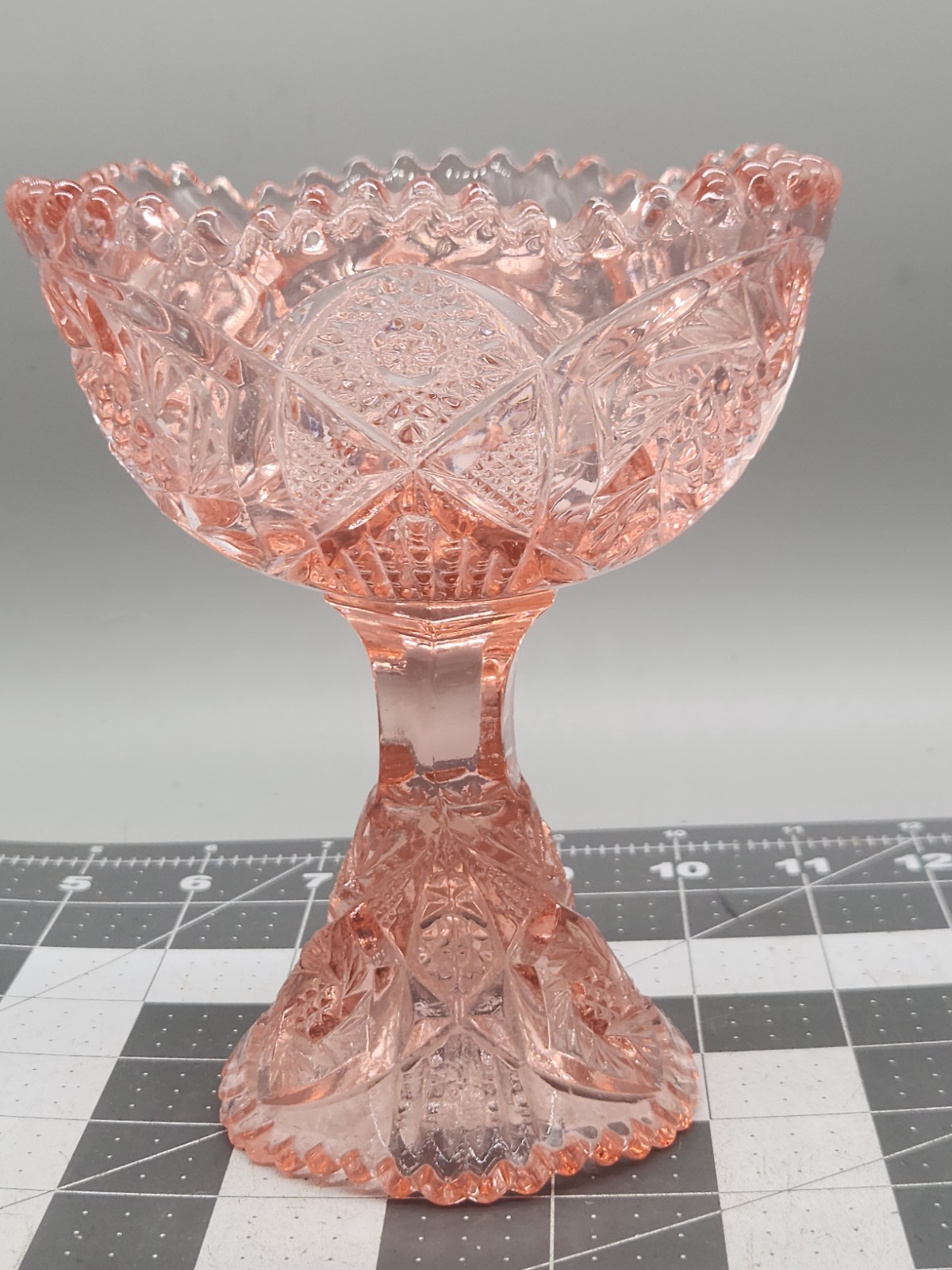 Aztec Heritage Carnival Glass Whirling Star Pedestal Compote Sawtooth Rim Pink