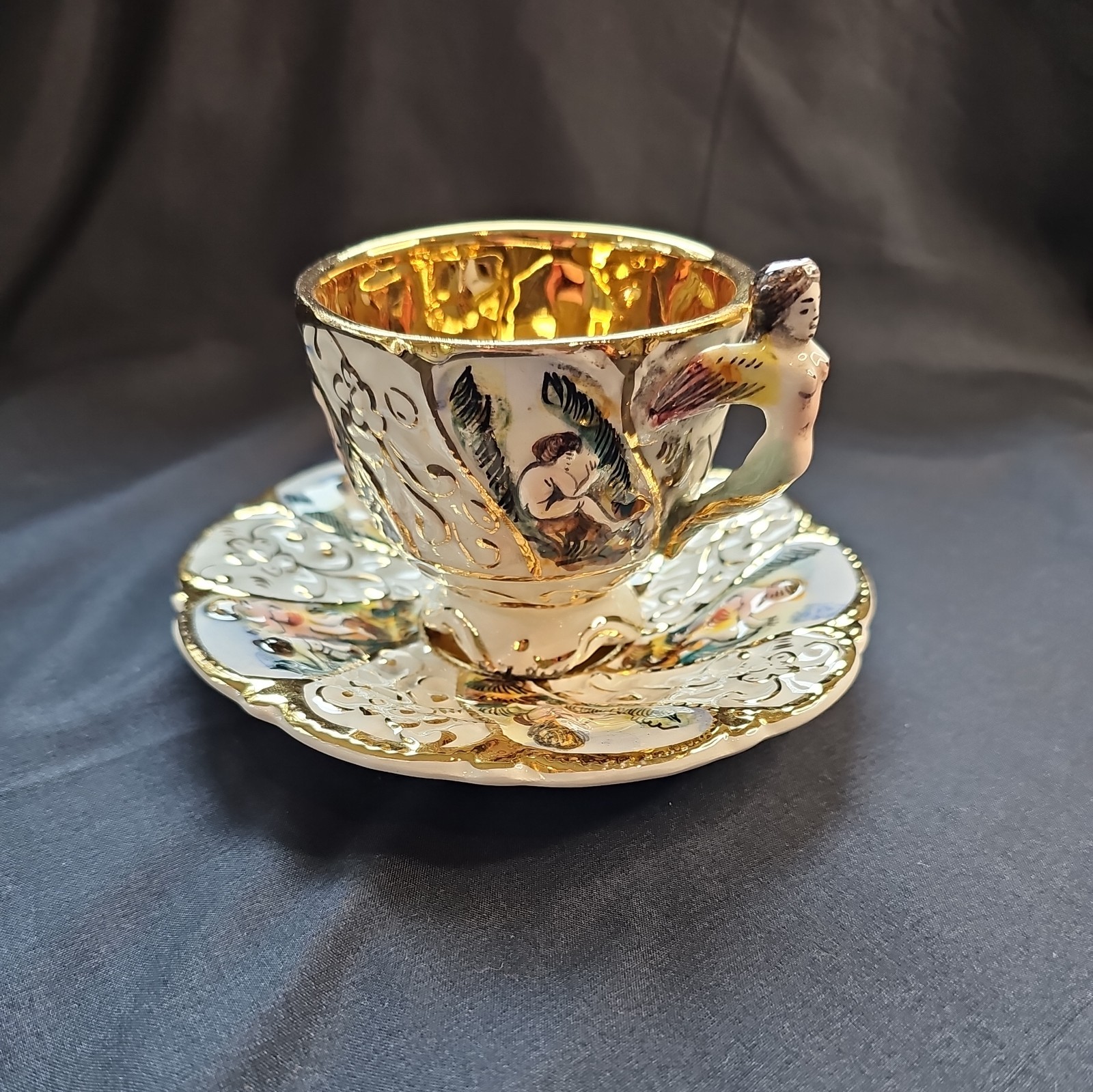 Vintage CAPODIMONTE Porcelain Hand painted Cherubs Tea Cup & Saucer, Gold Trim