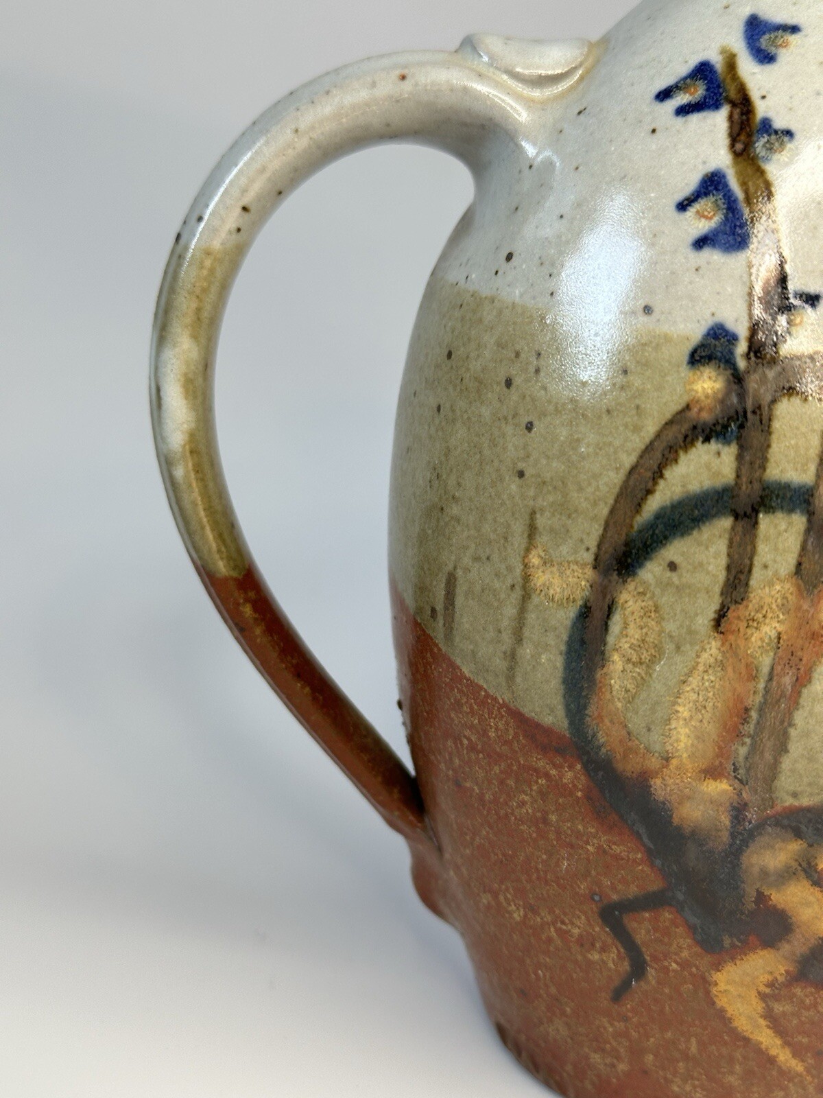 Signed AM stoneware jug, gray, tan, rust, blue, brown. Earthy Natural colors.