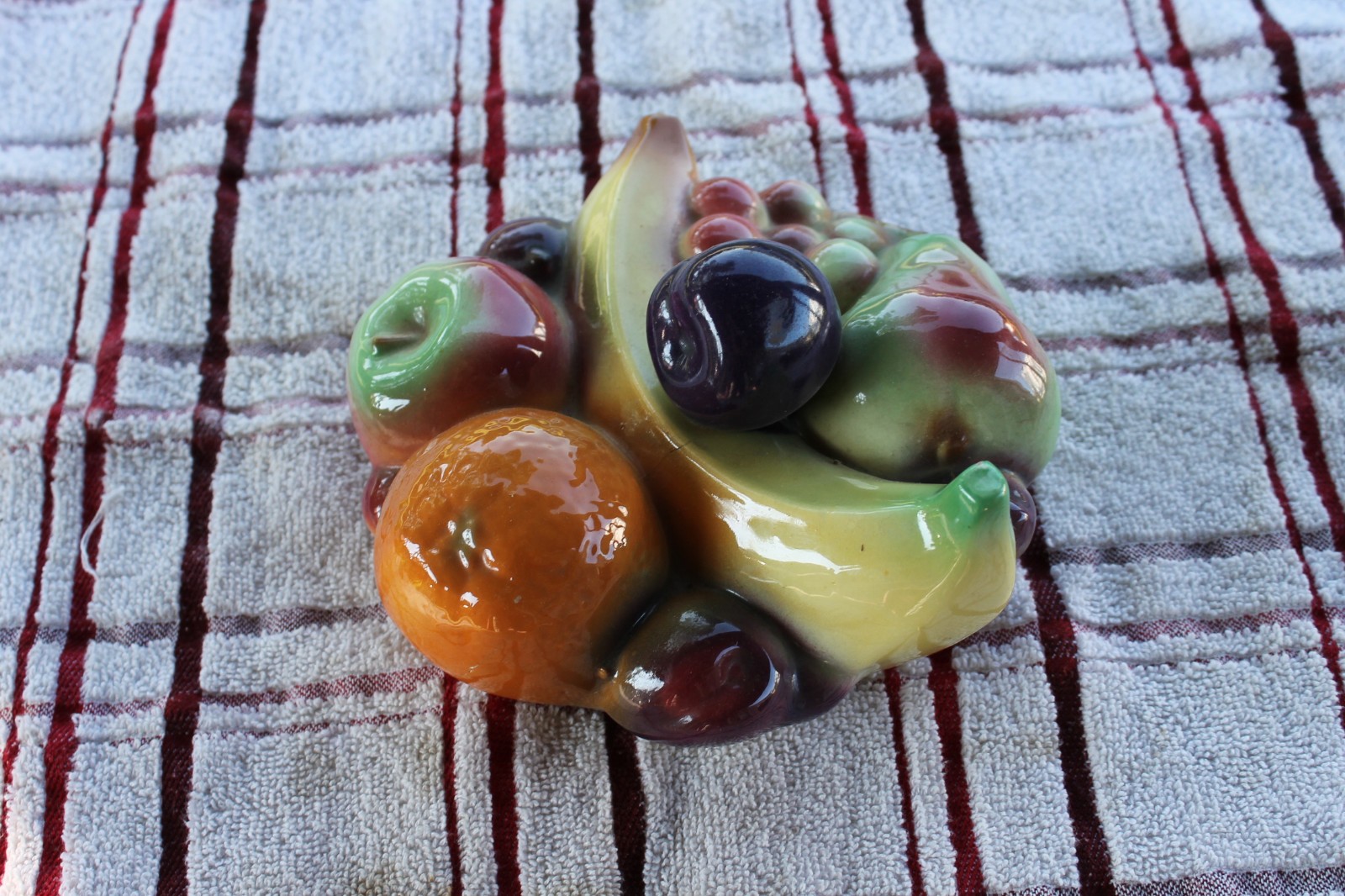 Cookie Jar with Lid Embossed Fruit has a crack look at pitures