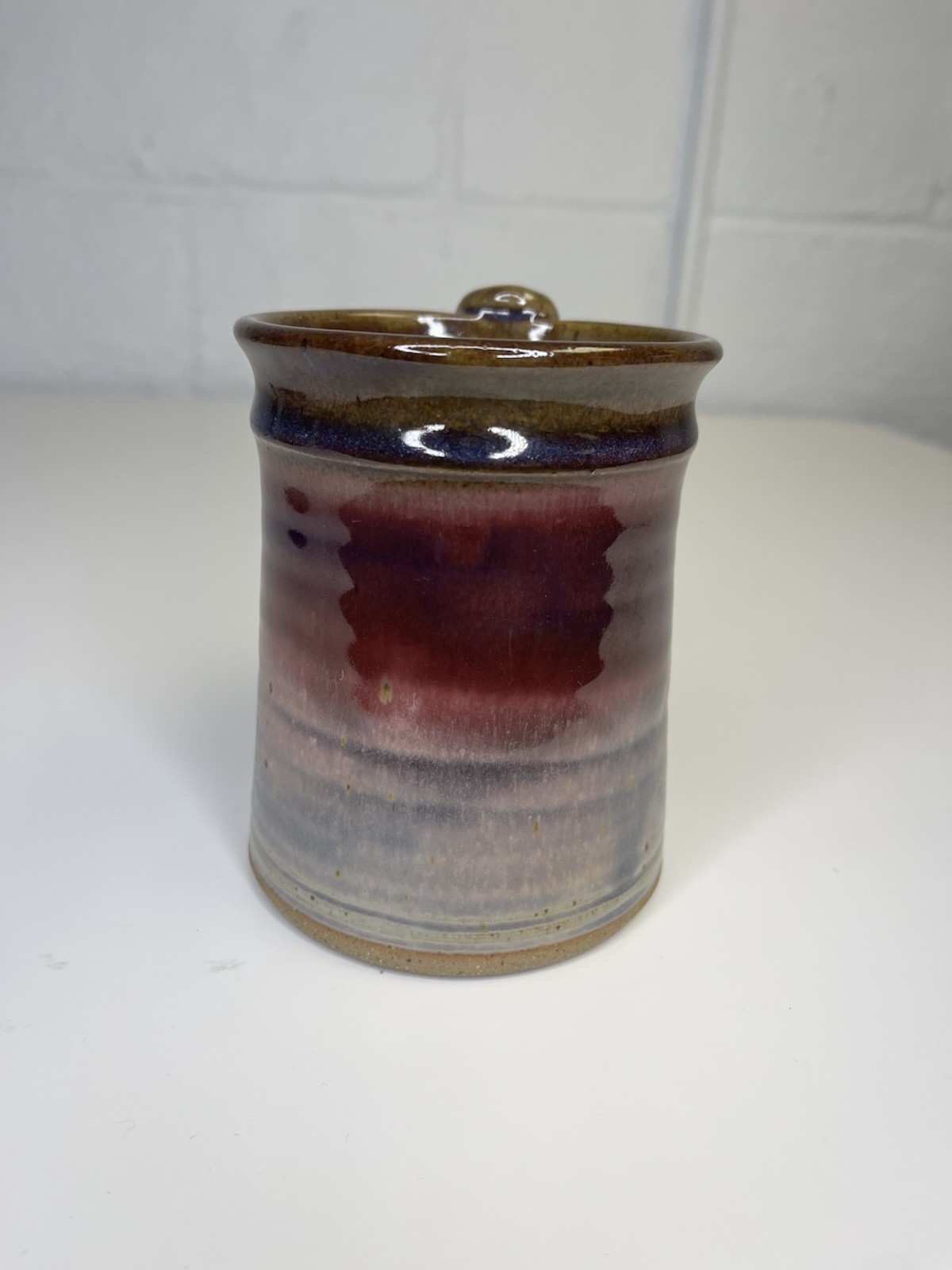 Nichols Pottery Stoneware Mug Variegated Drip Glaze Red Ivory Brown Thumb Rest