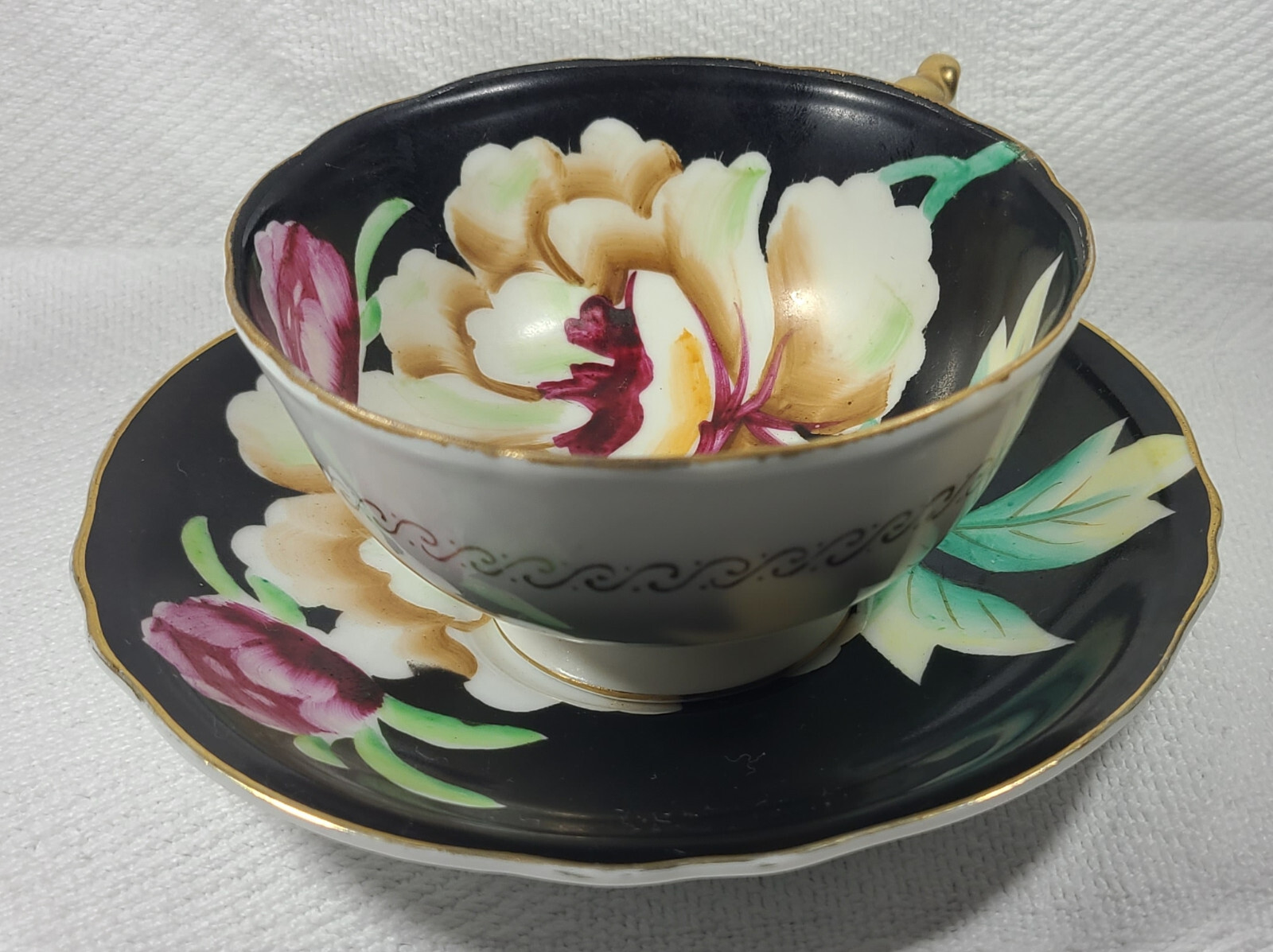 Hand Painted Orion Teacup and Saucer Made in Occupied Japan Black w/ Flowers