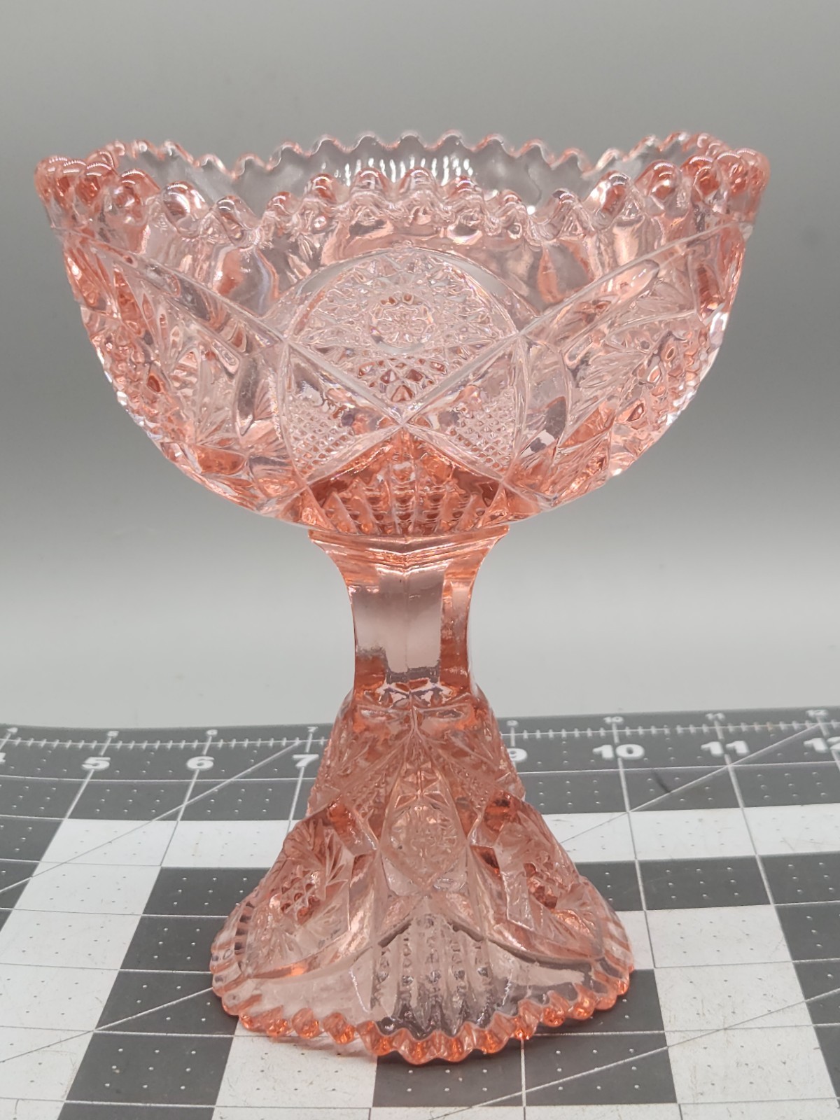Aztec Heritage Carnival Glass Whirling Star Pedestal Compote Sawtooth Rim Pink