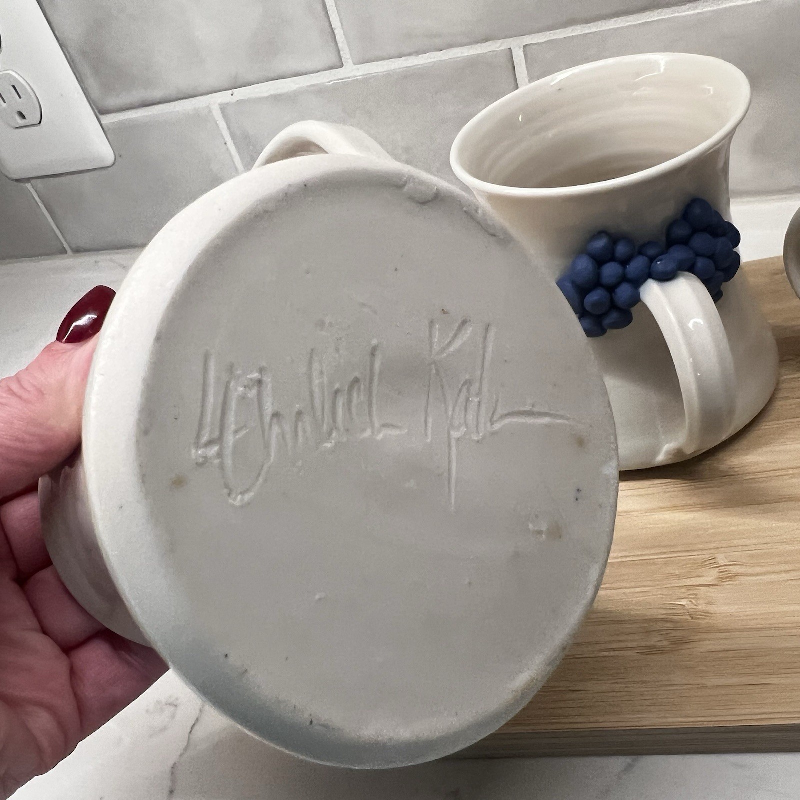 3 Handmade Pottery Mugs with blue grape design around handle, signed by artist