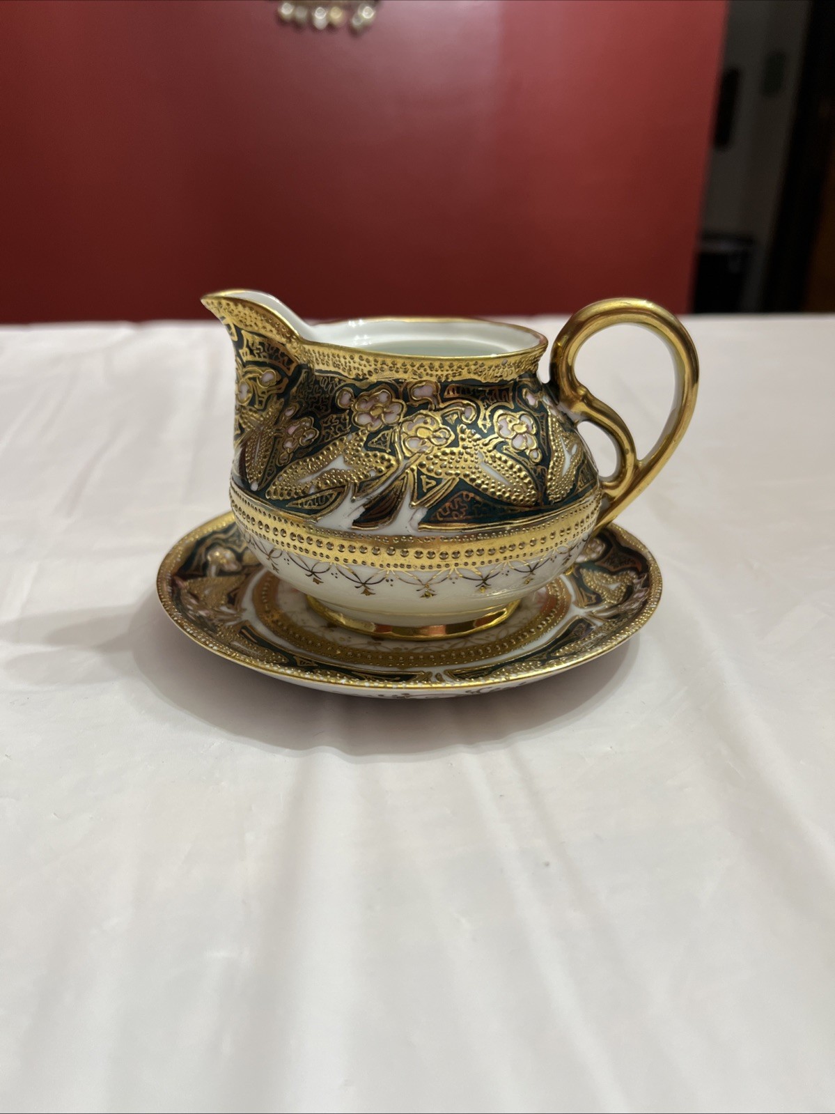 Nippon Hand Painted Creamer And Saucer
