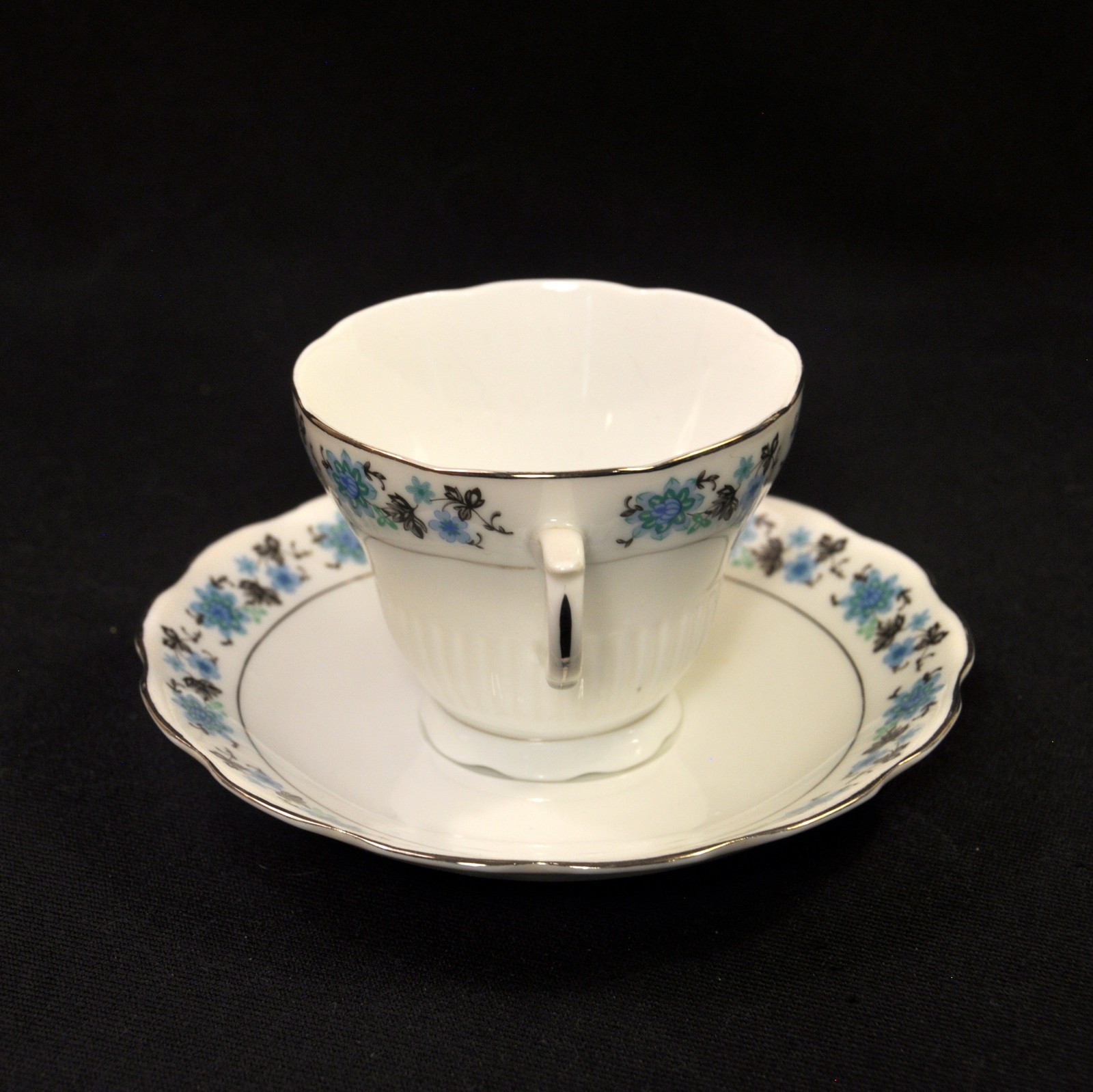 Cup & Saucer Floral w/Platinum on White Blue Black Scalloped Made in China