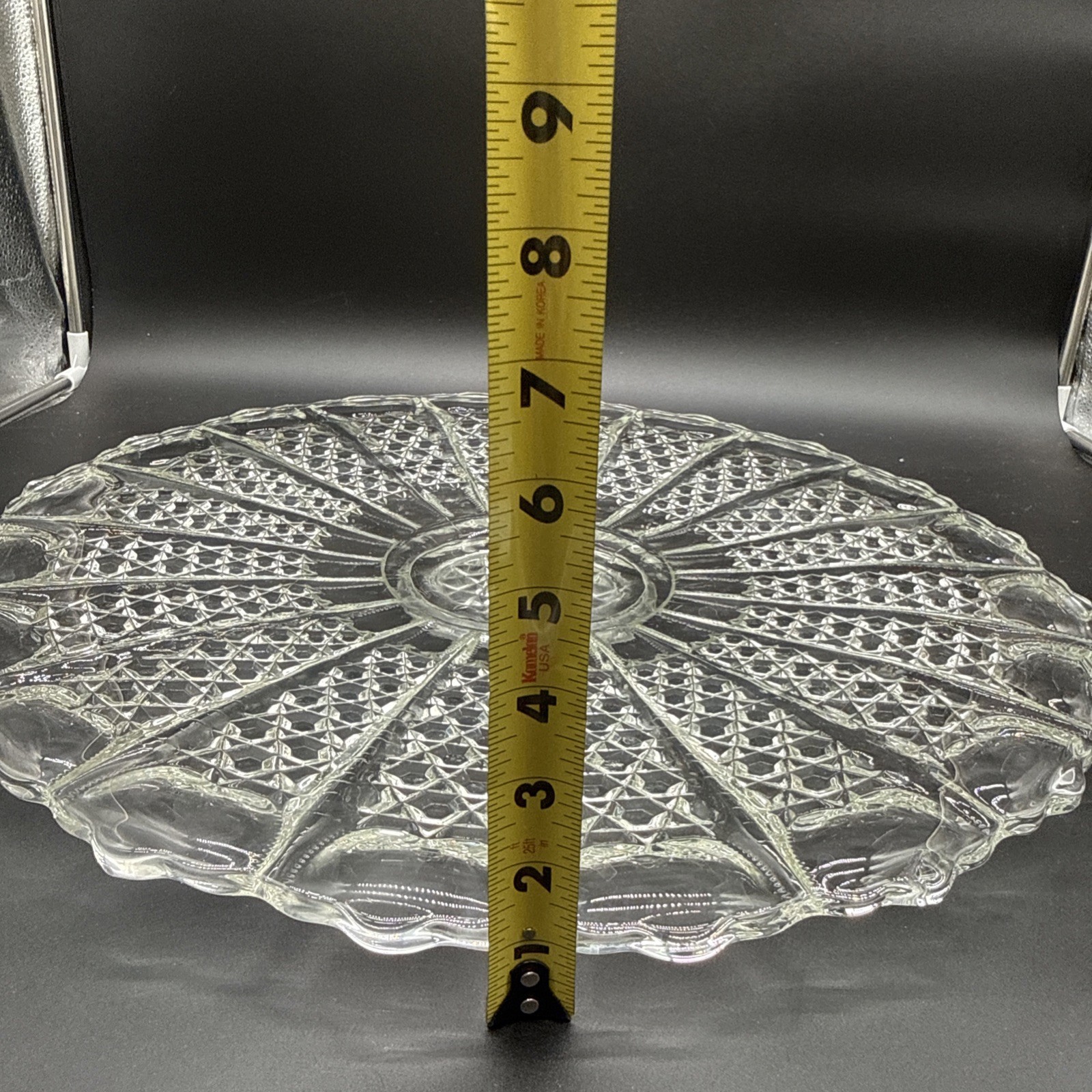 Cut crystal glass plate with radial diamond pattern