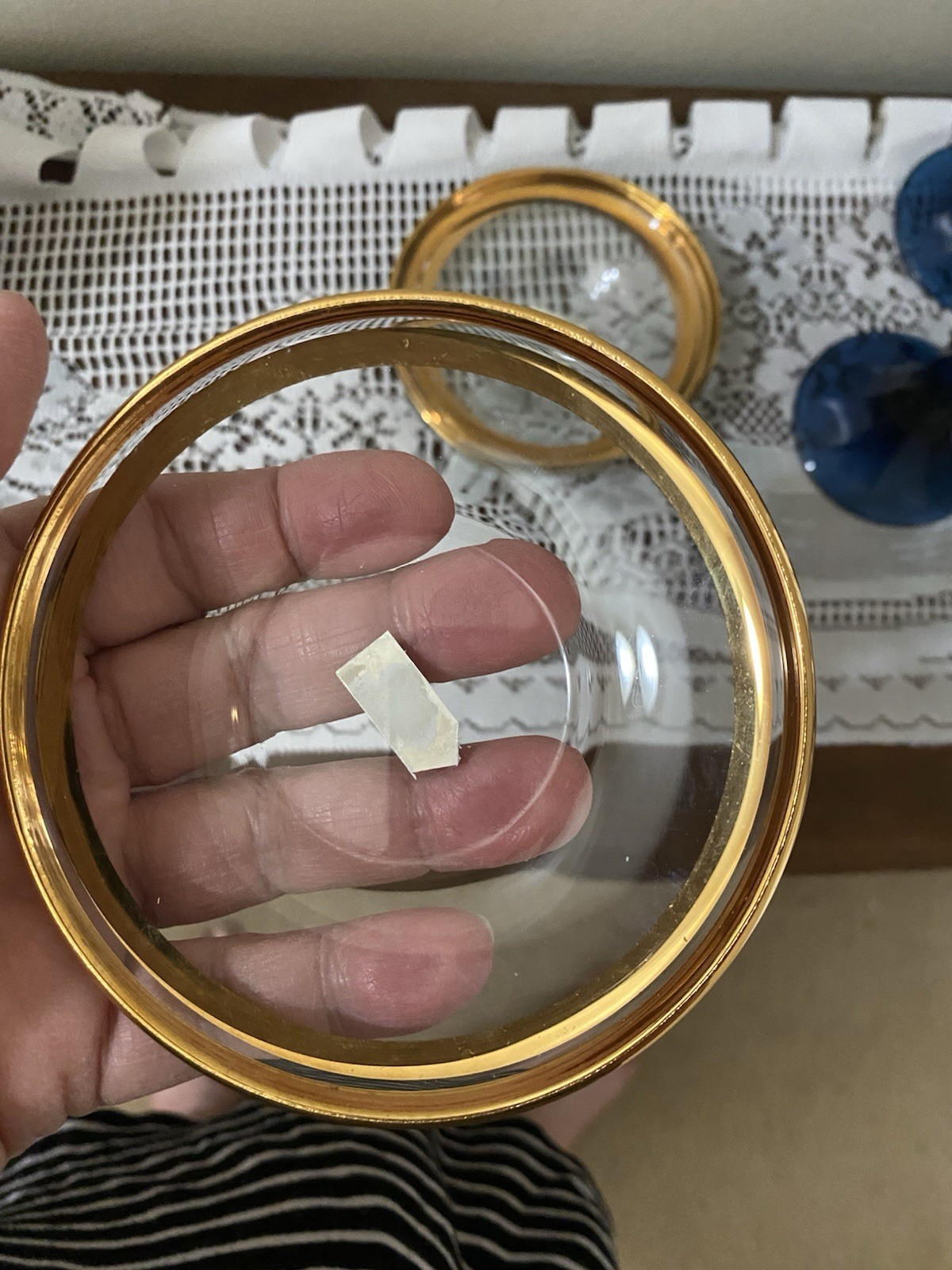 Vintage four piece set of glass plates with 22 karat gold trim. 4 1/2 inch plate