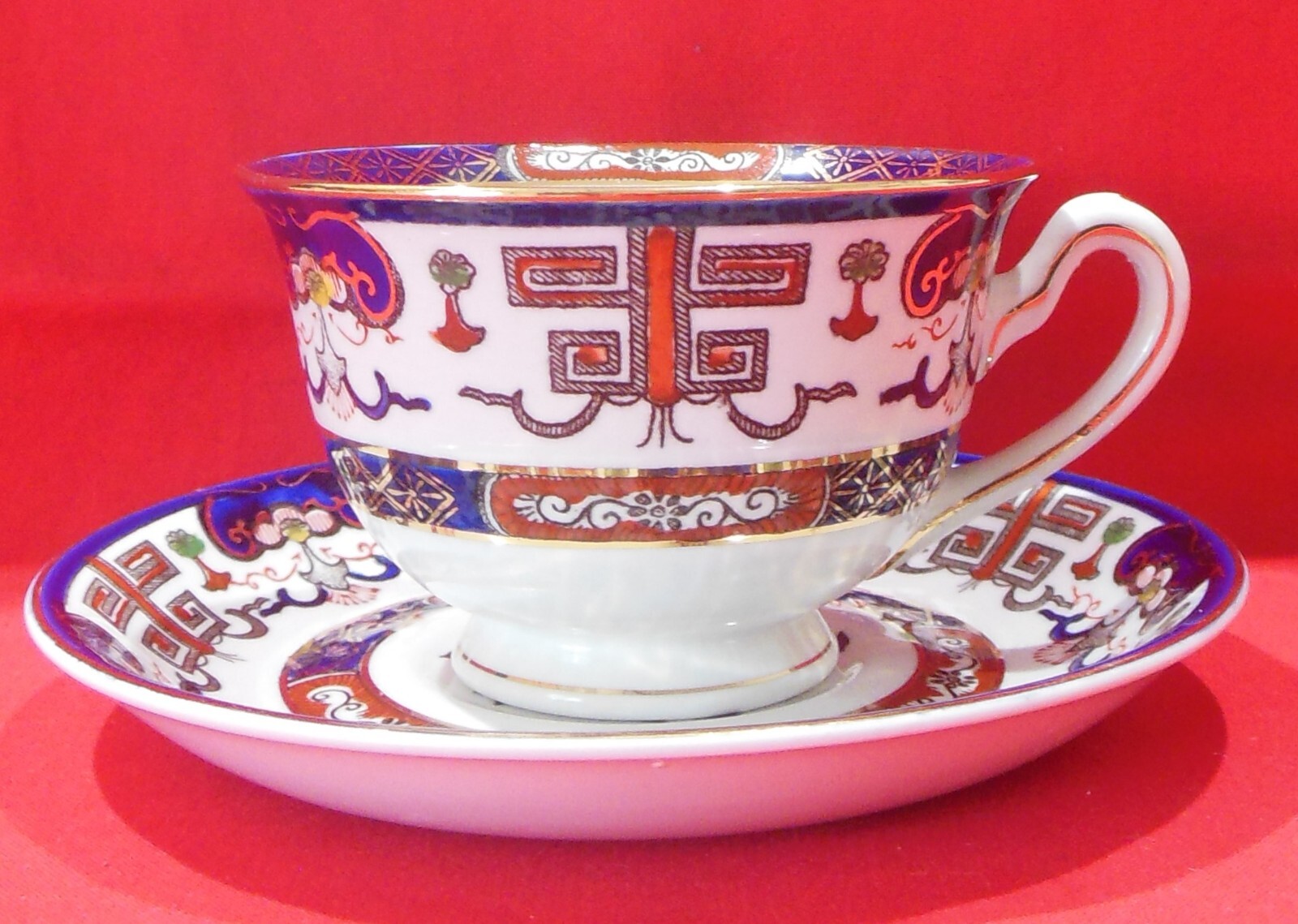 Nikko Ironstone Footed Cup & Saucer Set Blue Rust Gold Floral H491
