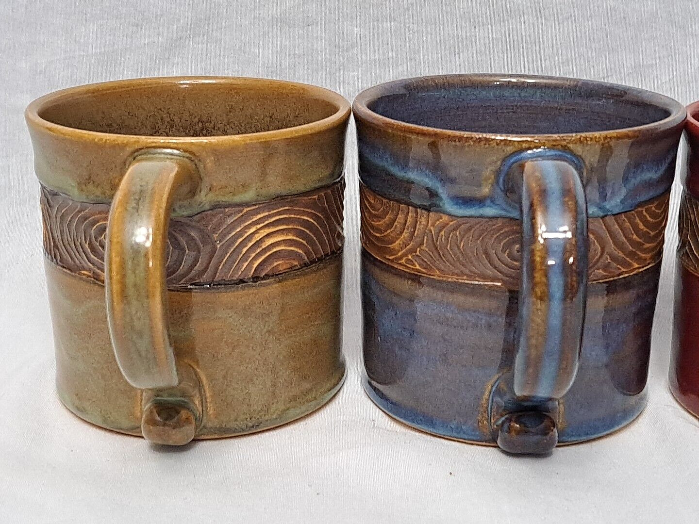 4 Studio Pottery Coffee Mugs Drip Glaze Native Island Look 18 Oz Carved Stamped